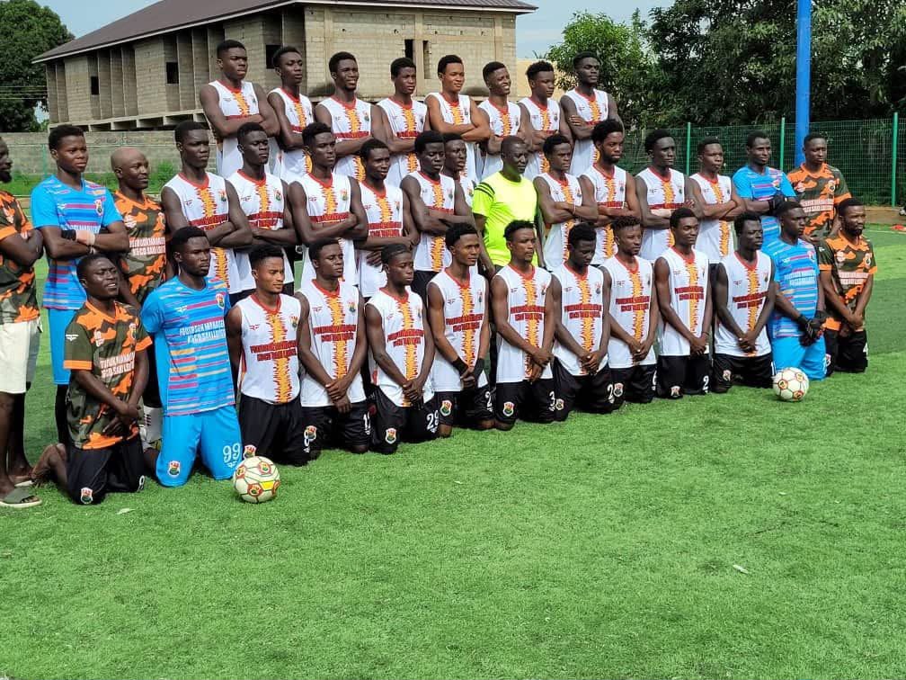 Sakibatiti Football Academy players and technical team at the football ground